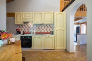 A kitchen or kitchenette at Casa Monica Ledro Attico