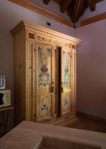 A bed or beds in a room at Casa Monica Ledro Attico
