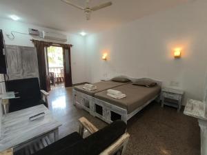SHANKAR by the SEA, 2 min from Mandrem Beach客房内的一张或多张床位