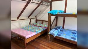 Finca con piscina los Eucaliptos Cali- Pance客房内的一张或多张床位