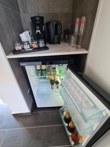Kuchyň nebo kuchyňský kout v ubytování Hedone - Overnachting met wellness