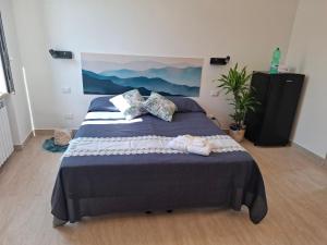 Postel nebo postele na pokoji v ubytování Sea Stone B&B