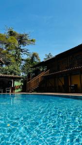 Bazén v ubytování Pousada e Residencial Villafranca nebo v jeho okolí