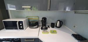 Kuchyň nebo kuchyňský kout v ubytování Maison Calme Terrasse et Jardin Vue Forêt