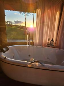Bilik mandi di Cabana na montanha, com hidro e Vista espetacular +56 gambar
