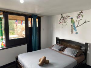 Voodi või voodid majutusasutuse Celaví Hostel toas