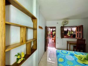 Hostal Nibuni Palomino客房内的一张或多张床位