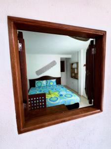 Hostal Nibuni Palomino客房内的一张或多张床位