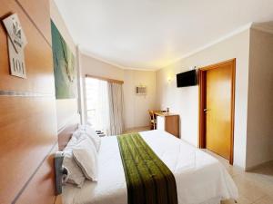 TV a/nebo společenská místnost v ubytování Hotel Dom Leopoldo