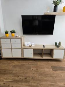 TV a/nebo společenská místnost v ubytování Apartamento Sun&Beach