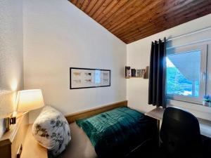 Postel nebo postele na pokoji v ubytování Ferienhaus Seeblick + 50 fotografií