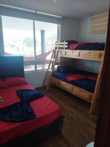 Postel nebo postele na pokoji v ubytování Villa Thaliana