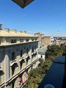 a view of the hotel windsor from the balcony of a building at Kneginje Ljubice Apartment in Belgrade