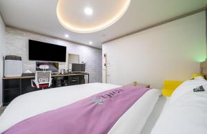 Postel nebo postele na pokoji v ubytování Soop Hotel
