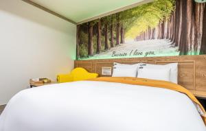 Postel nebo postele na pokoji v ubytování Soop Hotel