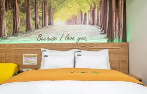 Postel nebo postele na pokoji v ubytování Soop Hotel