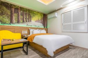 Postel nebo postele na pokoji v ubytování Soop Hotel