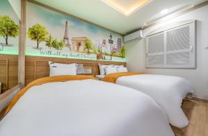 Postel nebo postele na pokoji v ubytování Soop Hotel