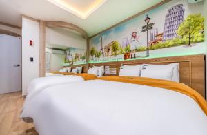Postel nebo postele na pokoji v ubytování Soop Hotel