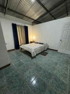 Voodi või voodid majutusasutuse Hostel Córa Chía toas
