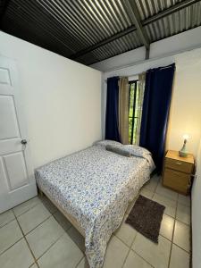 Postel nebo postele na pokoji v ubytování Hostel Córa Chía
