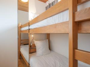 a bunk bed room with two bunk beds at Appartement familial au centre avec balcon et WiFi - FR-1-645-75 in LʼHuez