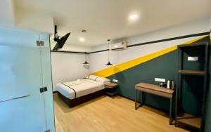 Postel nebo postele na pokoji v ubytování Seeds Hotel Selayang