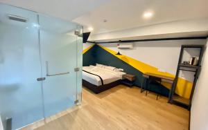 Postel nebo postele na pokoji v ubytování Seeds Hotel Selayang