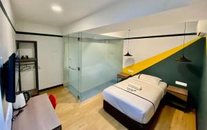 Postel nebo postele na pokoji v ubytování Seeds Hotel Selayang