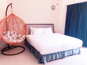 Llit o llits en una habitació de Happy Fat B&B 寵物友善