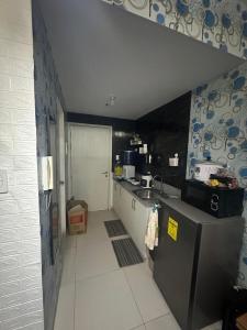 Kuchyň nebo kuchyňský kout v ubytování SMDC cool suites residence tagaytay