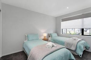 En eller flere senge i et værelse på Bealey Delight