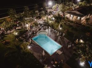 an overhead view of a swimming pool at night at Relais San Giovanni srls in Castellaneta