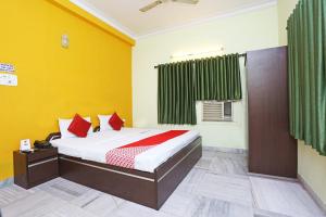 Postel nebo postele na pokoji v ubytování Hotel O Regency Guest house Near TCS Gitobitan + 23 fotografií