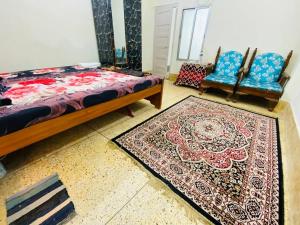 Ένα ή περισσότερα κρεβάτια σε δωμάτιο στο Prime Location Affordable Stay!