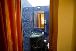 Koupelna v ubytování Hotel Lella