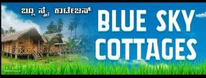 a sign that reads blue sky cures cities at Blue Sky Cottages Hampi in Hampi