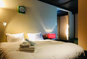Postel nebo postele na pokoji v ubytování Shakespeare Hotel