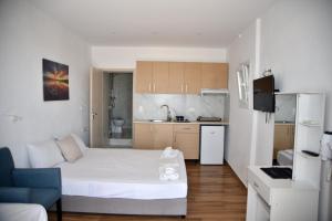 Kuchyň nebo kuchyňský kout v ubytování Jimmy's Apartments