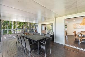 a dining room with a table and chairs at BIG4 Saltwater Yamba Holiday Park in Yamba