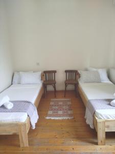 Letto o letti in una camera di Gremeli Wine & Hotel