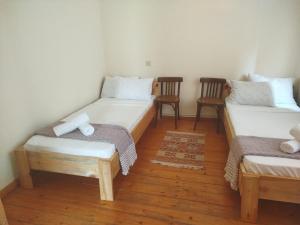 Letto o letti in una camera di Gremeli Wine & Hotel