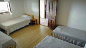 Letto o letti in una camera di Gremeli Wine & Hotel