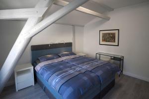 Postel nebo postele na pokoji v ubytování Brauhaus Suite 19