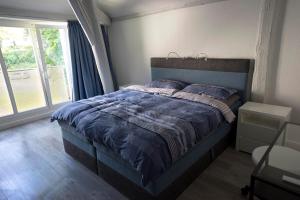 Postel nebo postele na pokoji v ubytování Brauhaus Suite 19