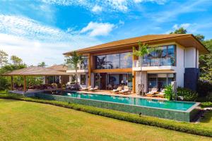 an image of a house with a swimming pool at Aquella Lakeside Villas in Thai Muang