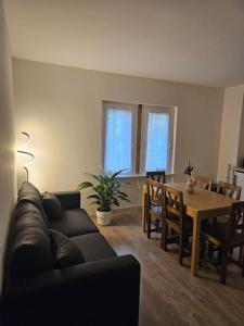 Posezení v ubytování Appartamento confortevole + 1 fotografie