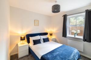 a bedroom with a bed and a window at Host & Stay - Shipwright Lodge in Whitby