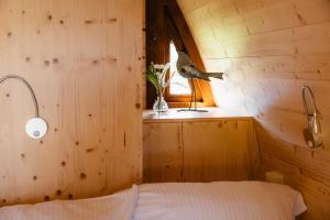 Postel nebo postele na pokoji v ubytování Appartementanlage am Arnumer See
