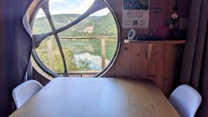 Postel nebo postele na pokoji v ubytování Cabanes et Lodges du Belvedere